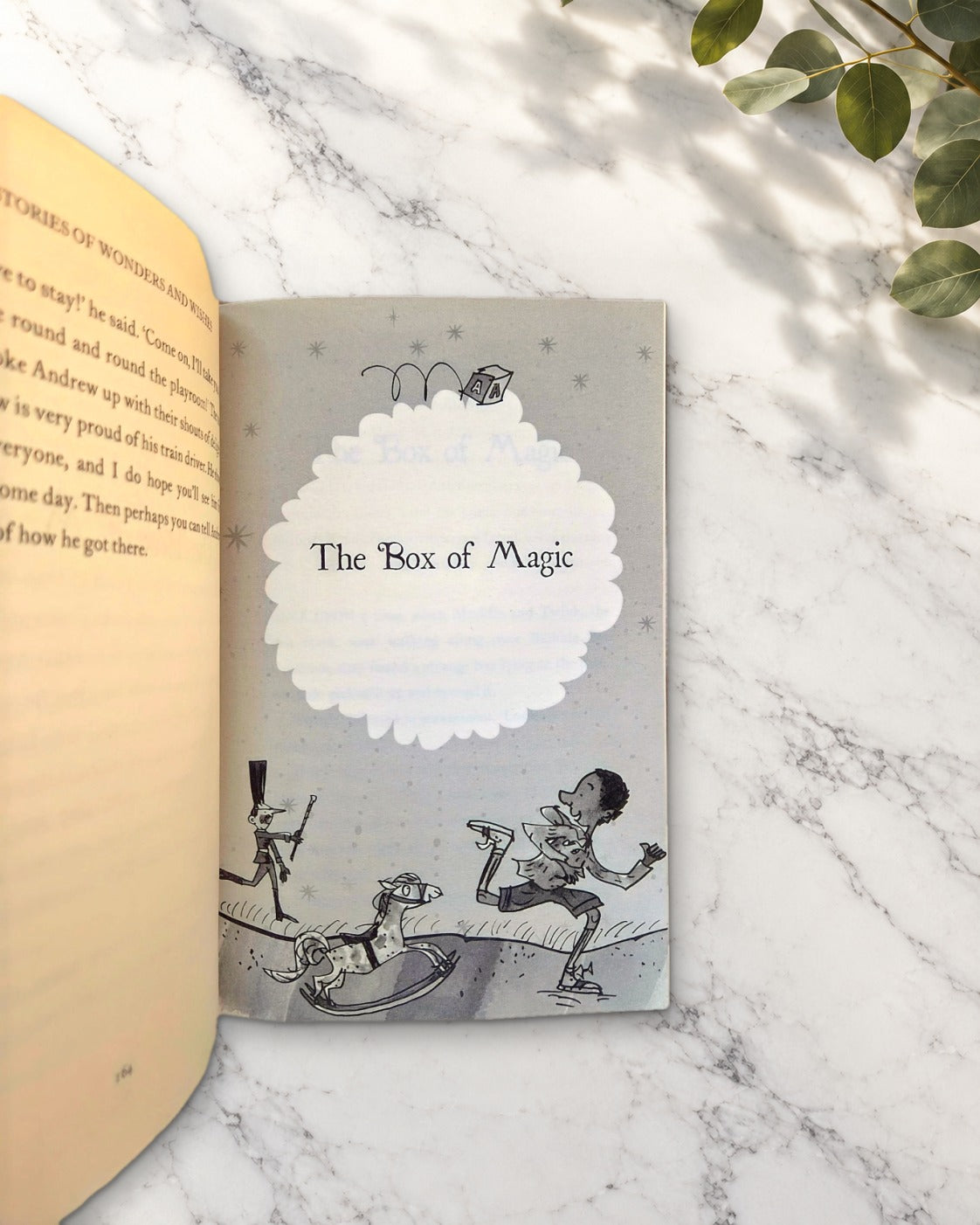 Stories of Wonders and Wishes, open book showing an illustrated chapter opener
