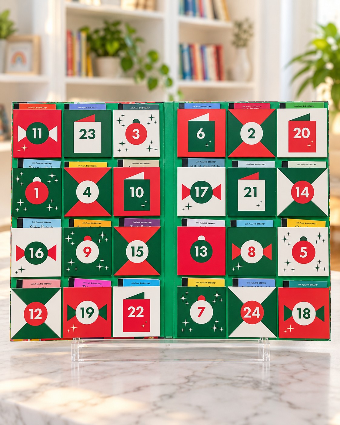 Little People, BIG DREAMS Advent Calendar, opened advent calendar showing 24 numbered doors with mini books tucked behind