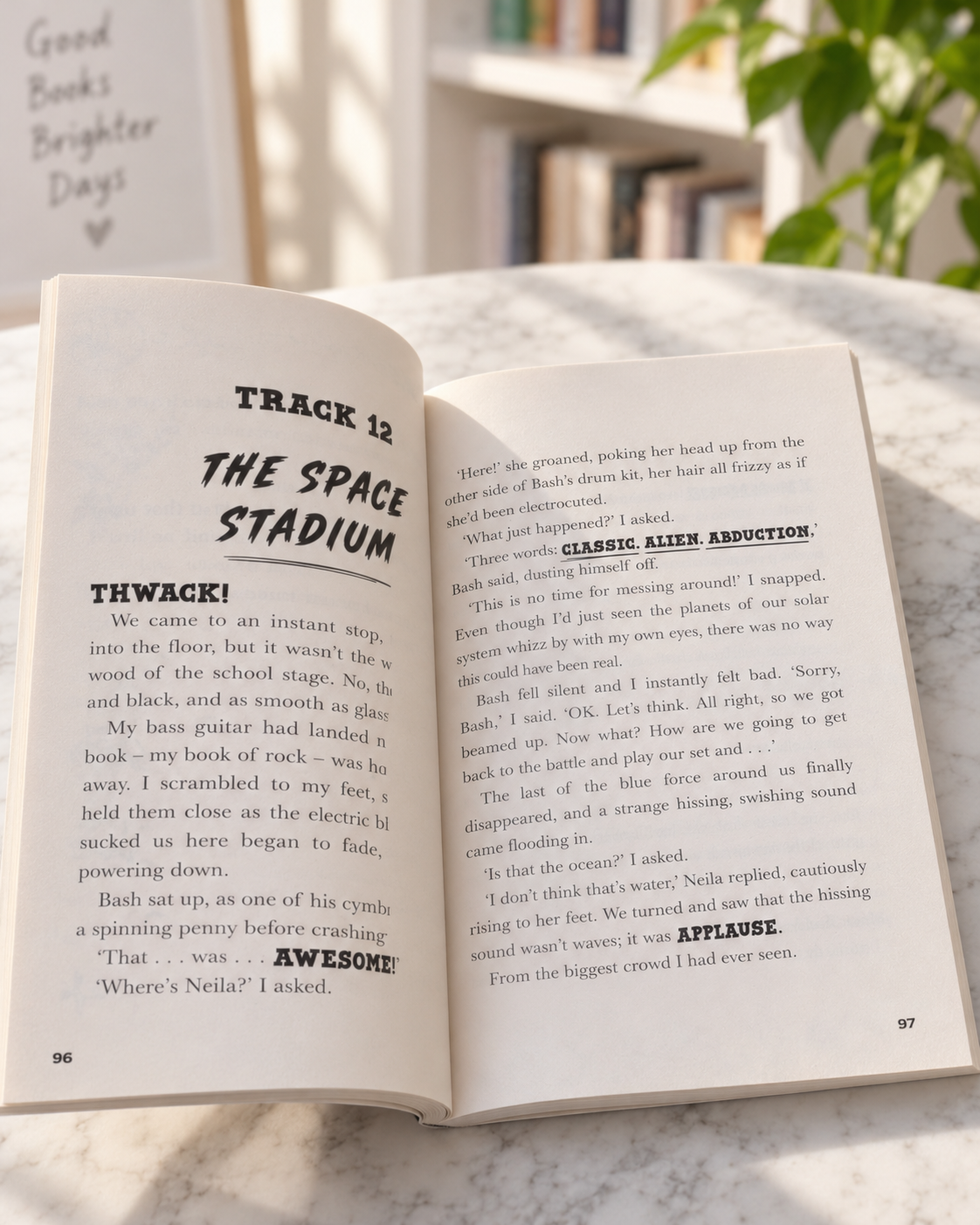 Space Band, open book showing big comic-style sound words